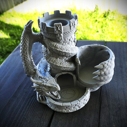 Grey dragon dice tower with integrated can holder, drink can and dice displayed in the front catching tray