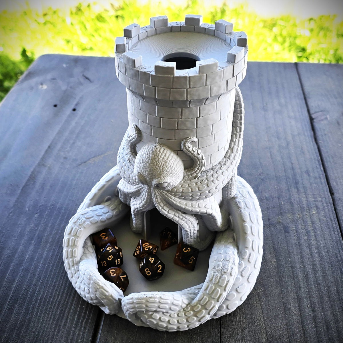 Kraken wrapped around castle turret dice tower