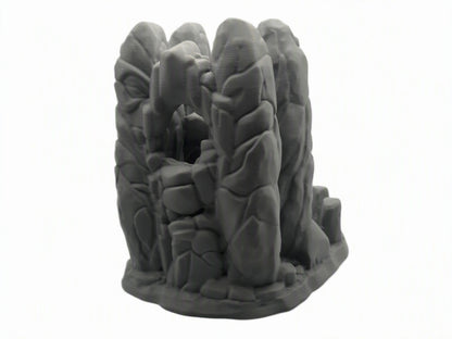 stone arch dice tower with creepy eyes